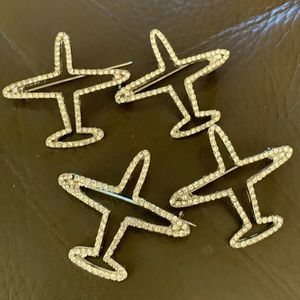 Jet setter brooch